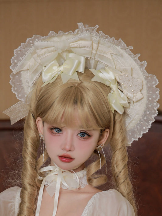 クリーミーな蝶結びヘアクリップ