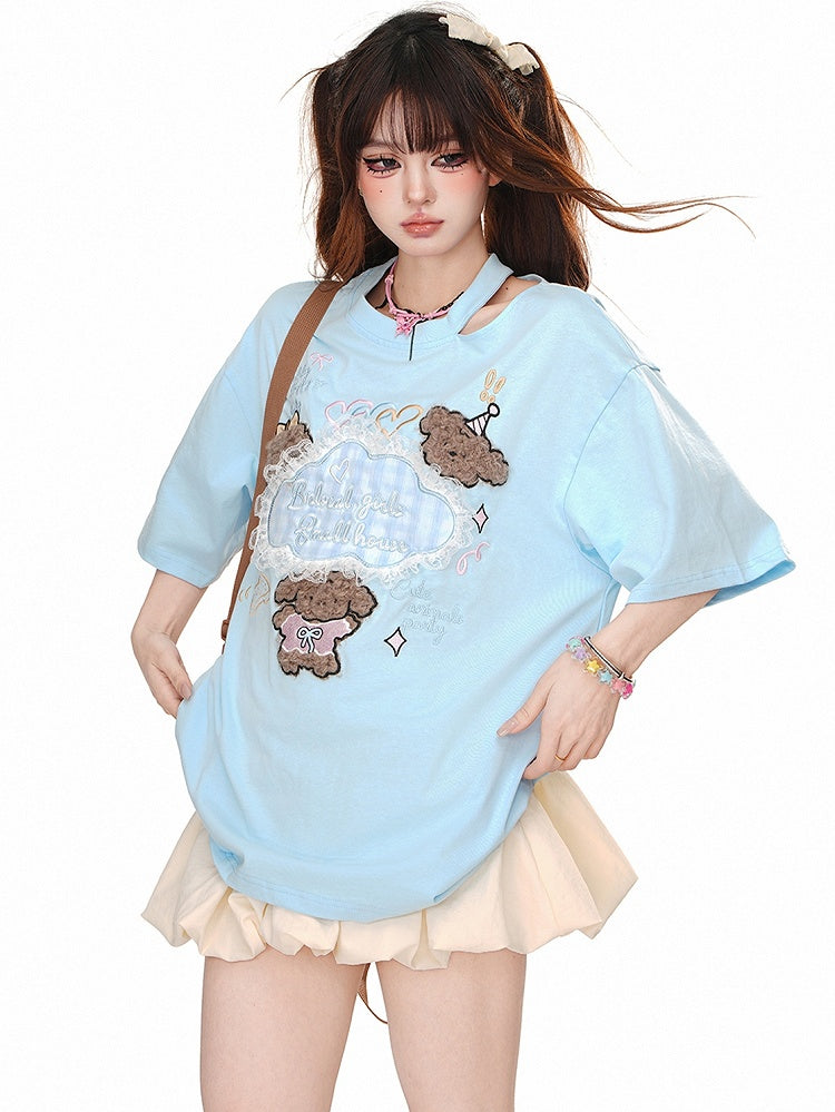 Blau/Apricot – Sommer-T-Shirt mit niedlichen Welpen-Applikationen und Cutout-Detail