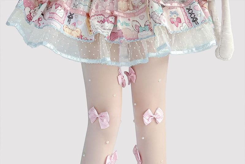 Transparente Strumpfhose mit Schleife