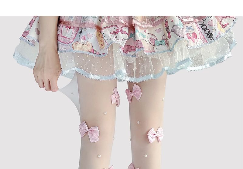 Transparente Strumpfhose mit Schleife
