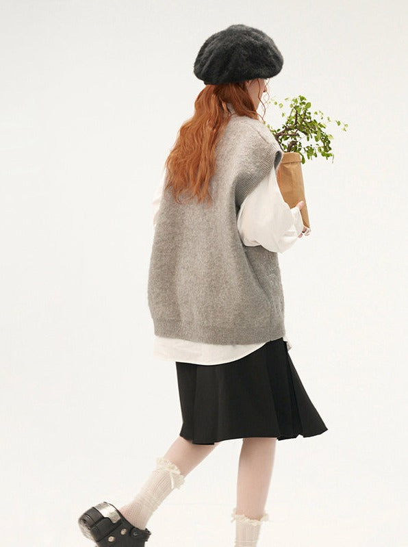Gilet tricoté formule Over