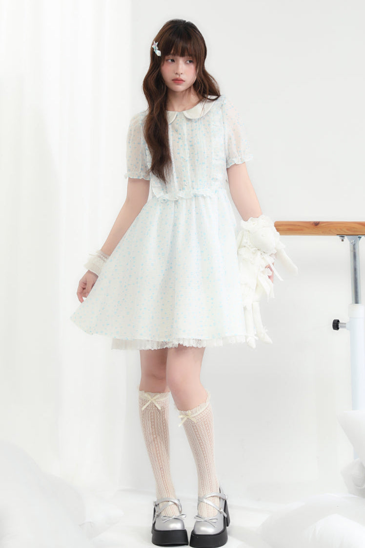 Puppe Ecosta Blumenkleid transparent