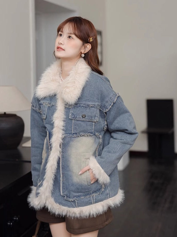 Veste en jean bleu à revers matelassés