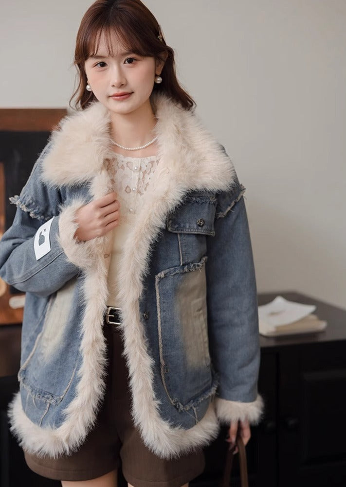 Veste en jean bleu à revers matelassés