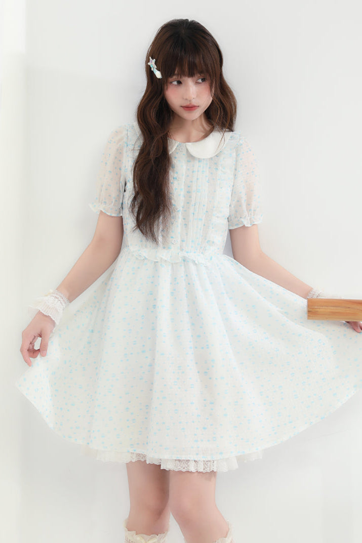 Puppe Ecosta Blumenkleid transparent