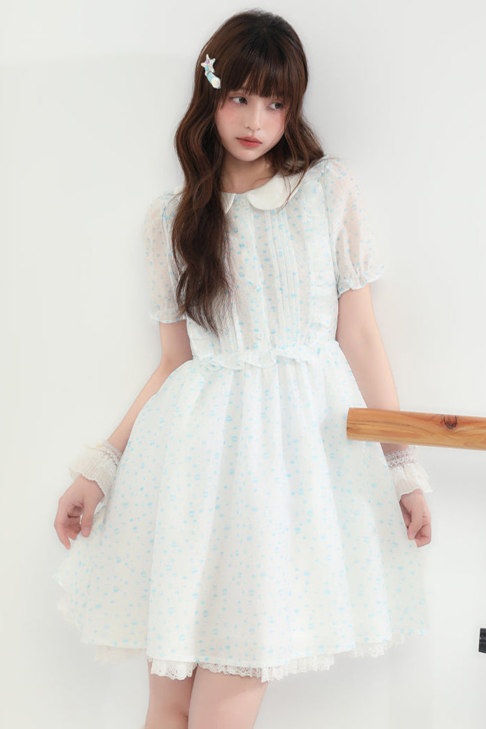 Puppe Ecosta Blumenkleid transparent