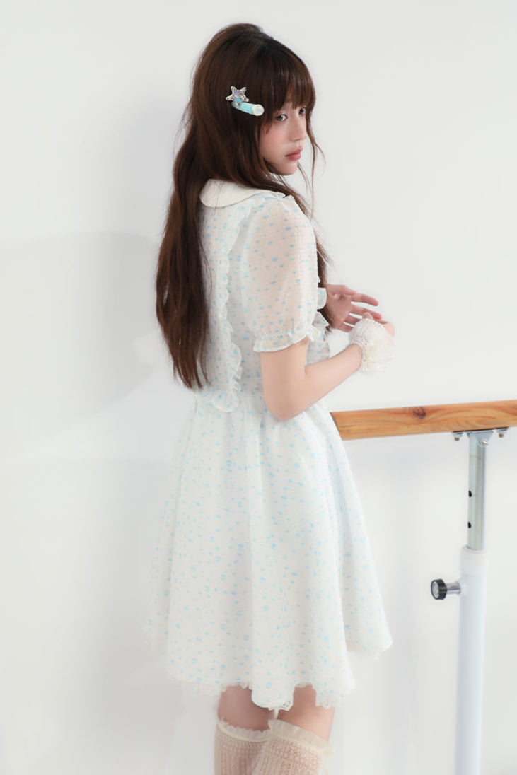 Puppe Ecosta Blumenkleid transparent