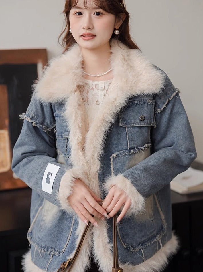 Veste en jean bleu à revers matelassés