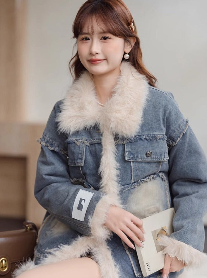 Veste en jean bleu à revers matelassés
