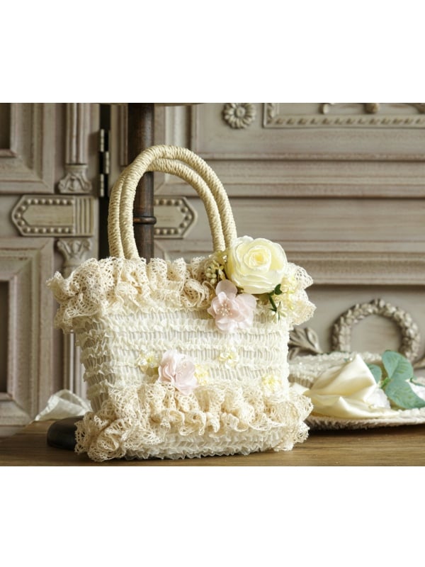 Beige/rosa Handtasche mit Blumenmotiv und gewebten Akzenten