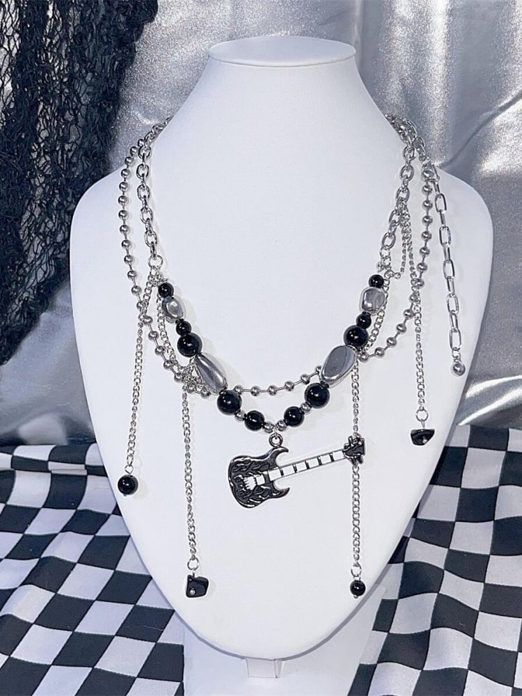 Collier double rang de perles noires style guitare punk des années 2000