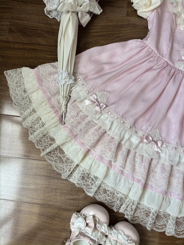 Süßes Lolita-Kleid mit Puffärmeln, Schleife, leichten Details, rosa OP, gestufter Spitzenbesatz