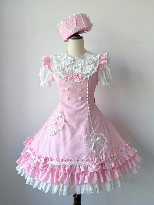 Rosa Lolita-Kleid mit Rüschen und Krankenschwester-Saum, gepunktetem Lagenmuster