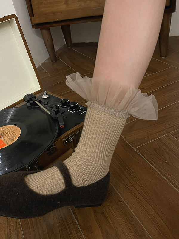 Chaussettes mollet blanches à bordure en dentelle douce