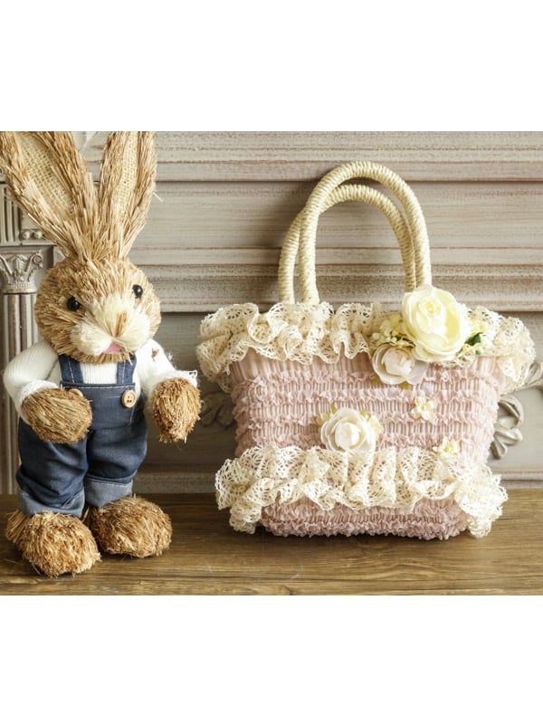 Beige/rosa Handtasche mit Blumenmotiv und gewebten Akzenten