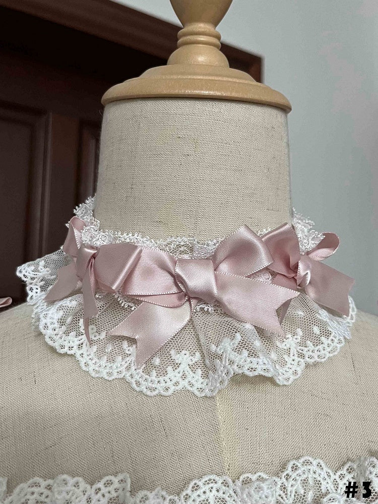 Rosa Choker mit weißen Schleifen