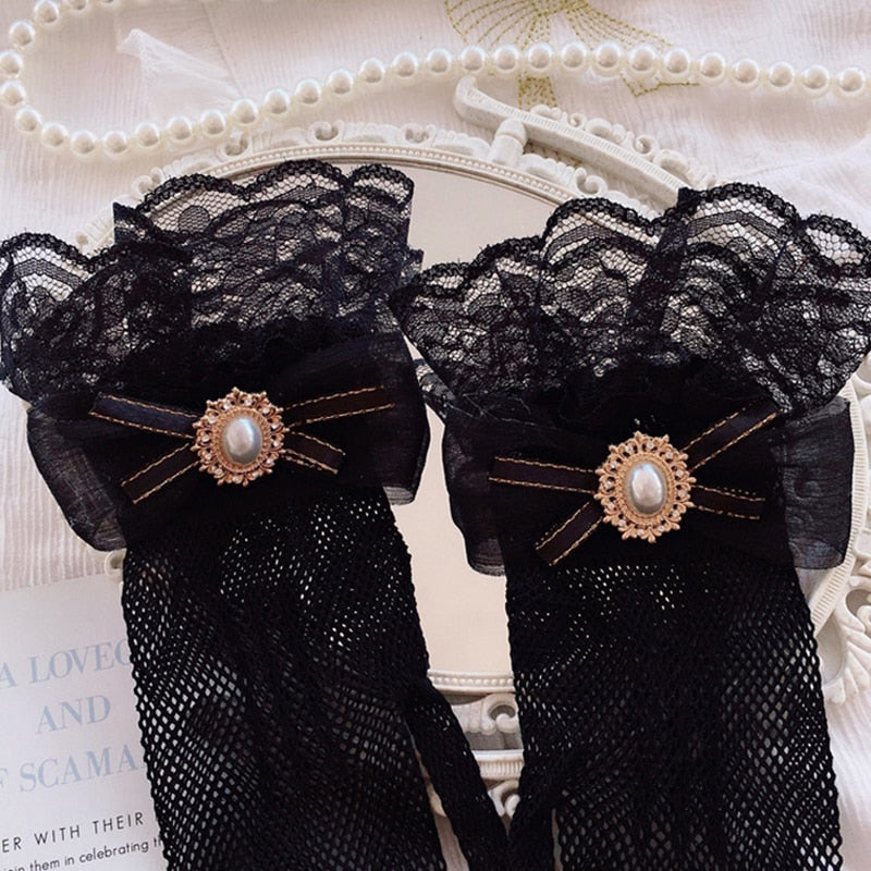 Süße viktorianische Spitzenhandschuhe