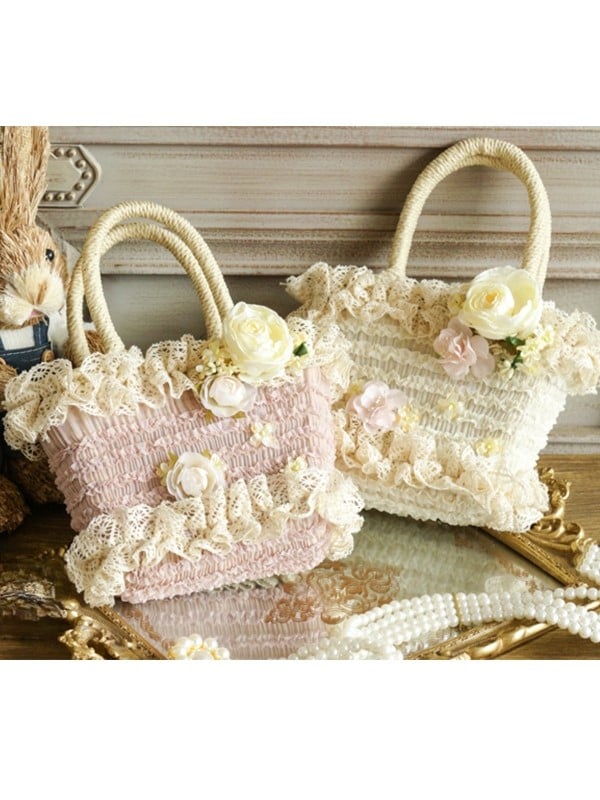 Beige/rosa Handtasche mit Blumenmotiv und gewebten Akzenten