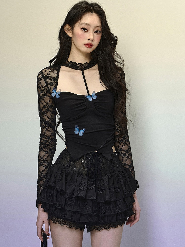 Schwarzes Neckholder-Top mit asymmetrischem Saum und verziertem Ausschnitt