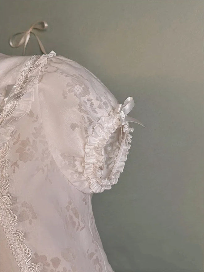 Pan – Peter-Bluse mit weißem Kragen und Puffärmeln