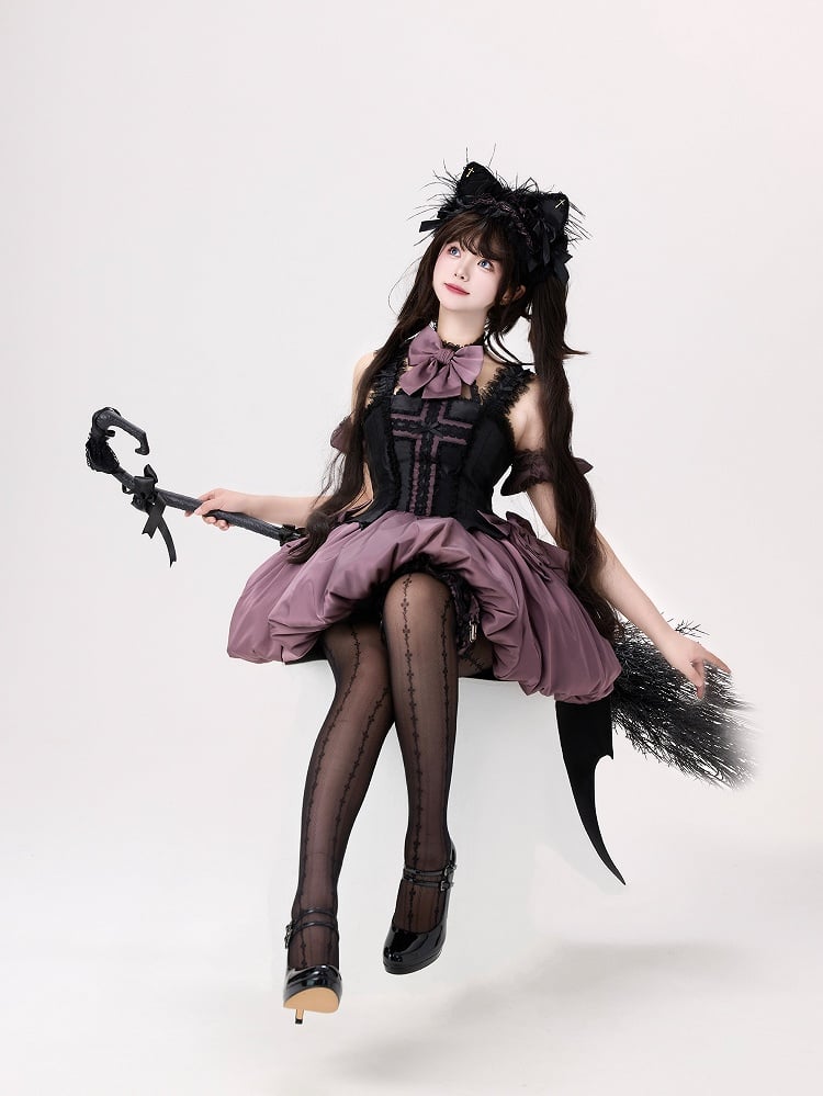 Jupe bulle noire et violette avec ailes de chauve-souris dans le dos