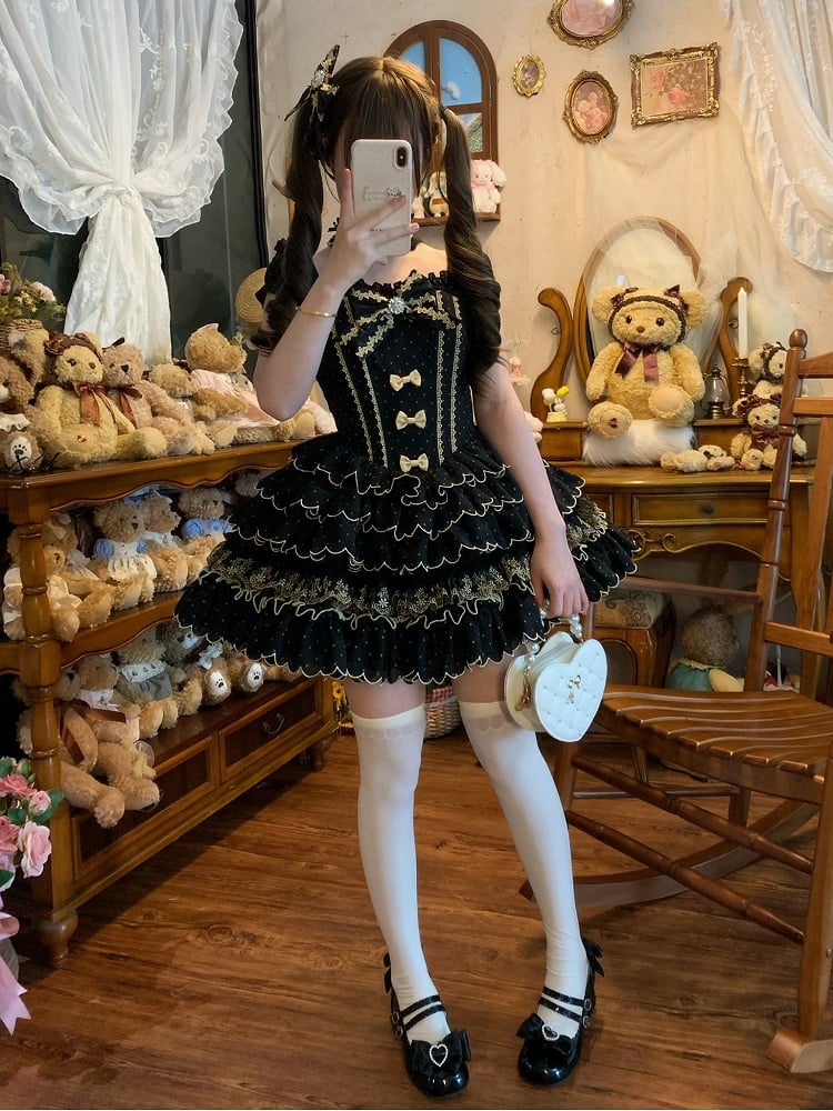 Gestufte schwarze Lolita-Taille mit Jakobsmuschelmuster und Tupfenmuster mit Kleiderbesatz und Prinzessinnensaum