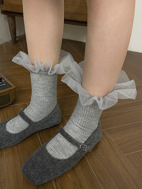 Chaussettes mollet blanches à bordure en dentelle douce