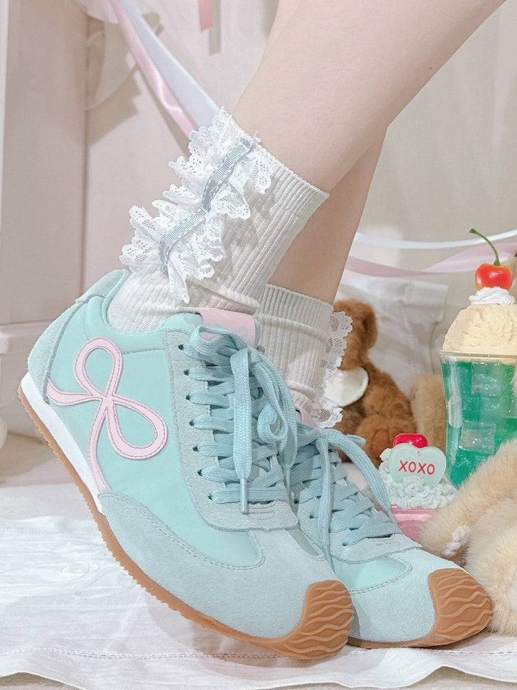 Grüne Schnürschuhe mit Schleife vorne