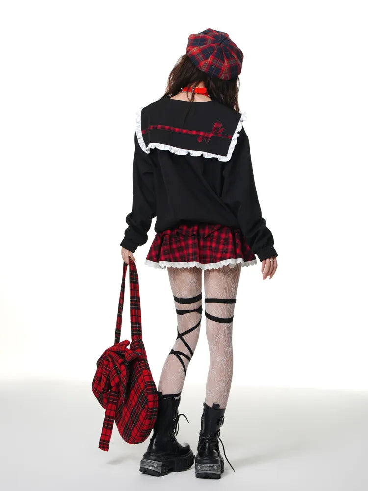 Roter karierter Rock mit Spitzenbesatz