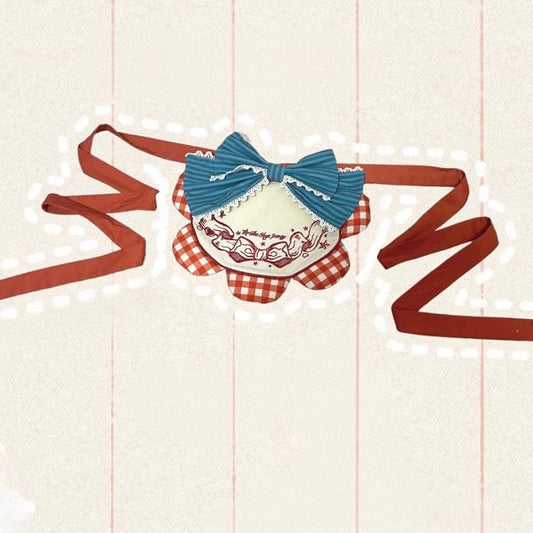 蝶結び刺繍の赤と青のエプロン