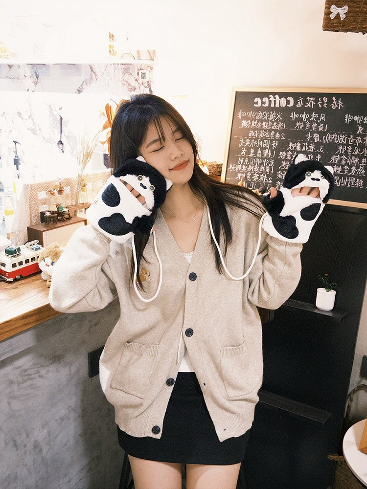 黒と白のかわいい猫の形をしたぬいぐるみ手袋