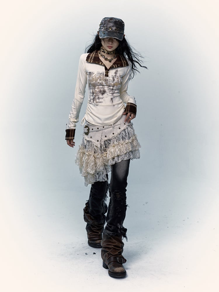 Beiger Spitzenrock mit asymmetrischem Saum, Distressed-Besatz und Schnallendetail