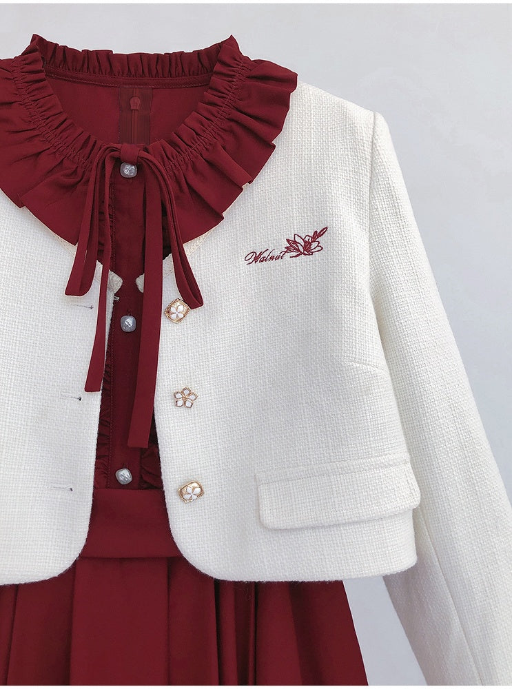 Weiße Tweedjacke mit Blumenstickerei