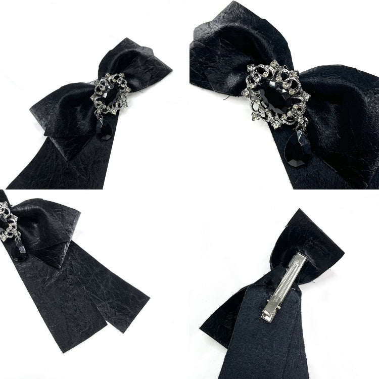 Schwarze Haarspange mit Strasssteinen und Schleife
