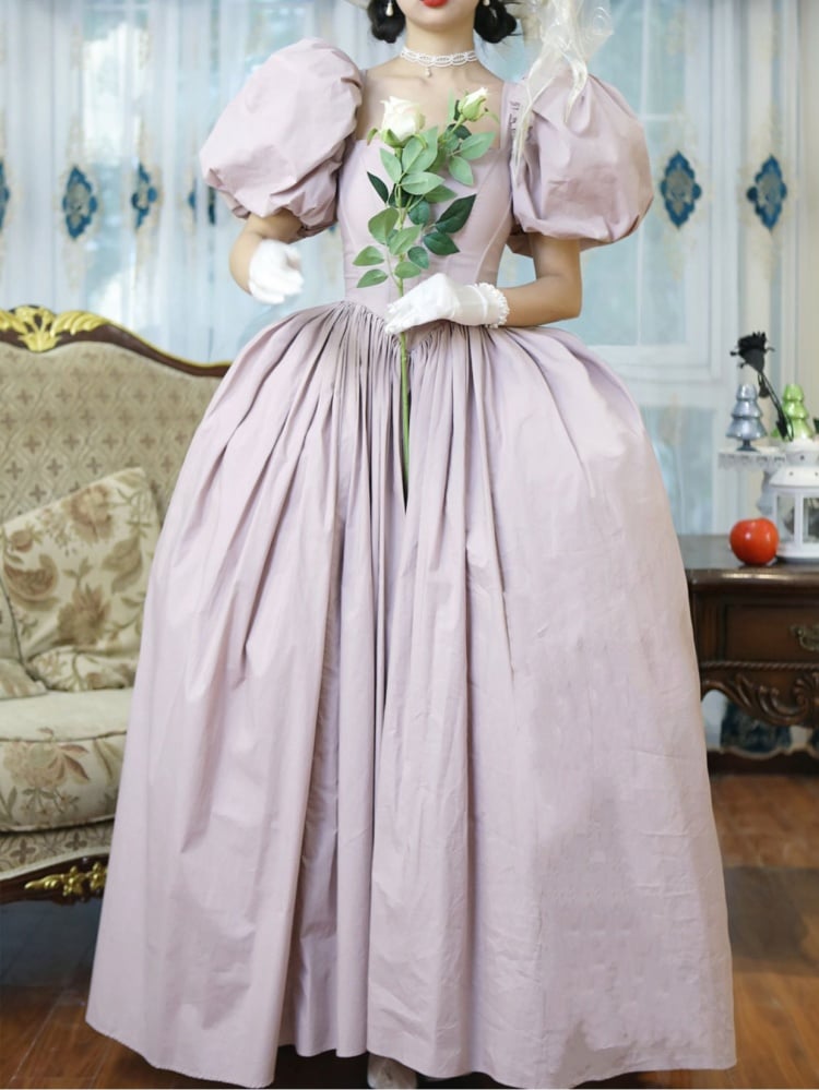 Hellrosa Korsett-Belles-Kleid mit kurzen Puffärmeln