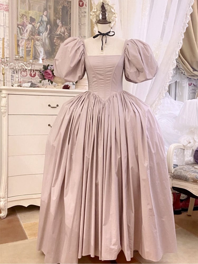 Hellrosa Korsett-Belles-Kleid mit kurzen Puffärmeln