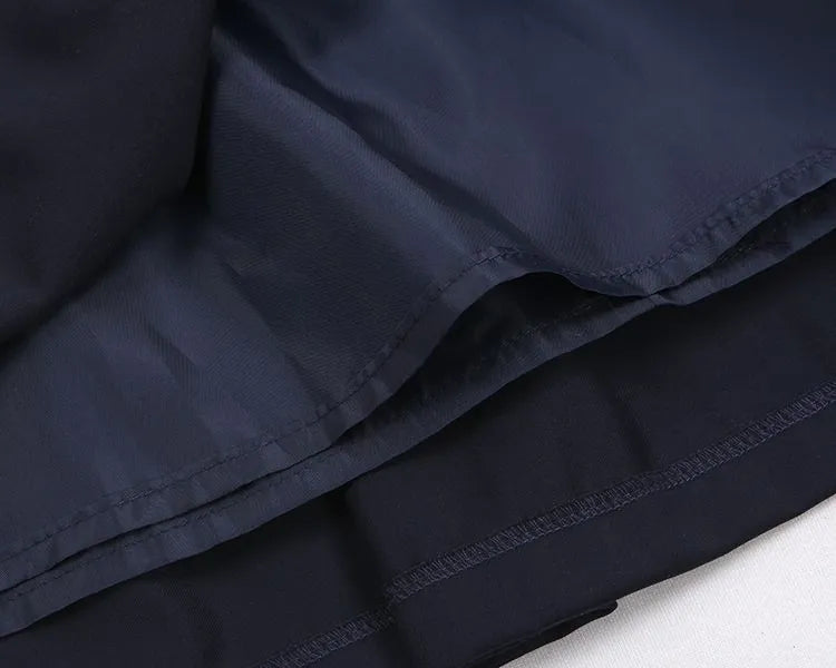 ダーク刺繍のブルーパンカラーの蝶結びピータードレス