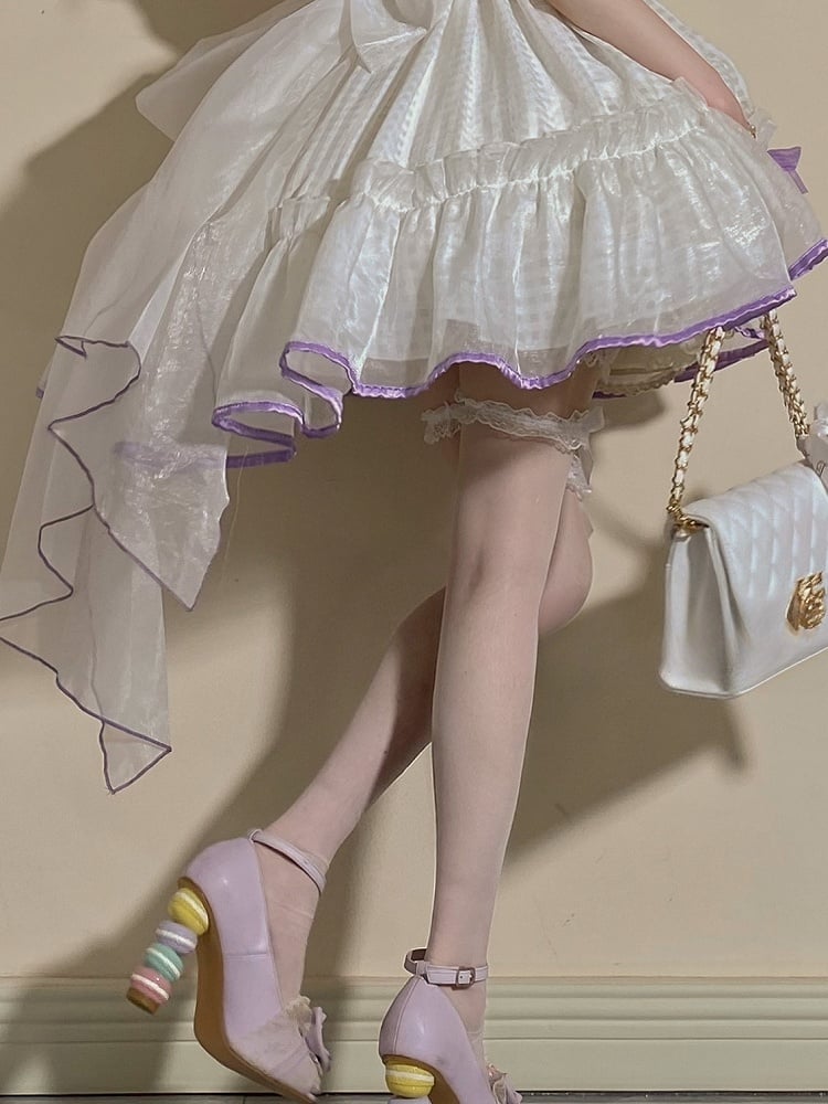 Bas blancs/noirs semi-transparents en dentelle à volants avec nœud sur le genou