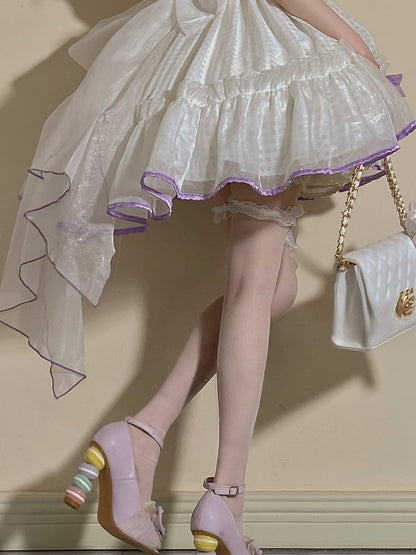 Bas blancs/noirs semi-transparents en dentelle à volants avec nœud sur le genou