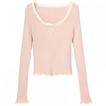 Haut en maille slim à col rond et détails nœud rose