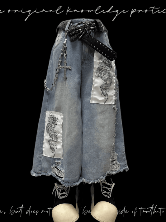Blaue Jeans mit weitem Bein, Drachen-Applikation, ungesäumter Saum, abgenutzte Löcher, leicht