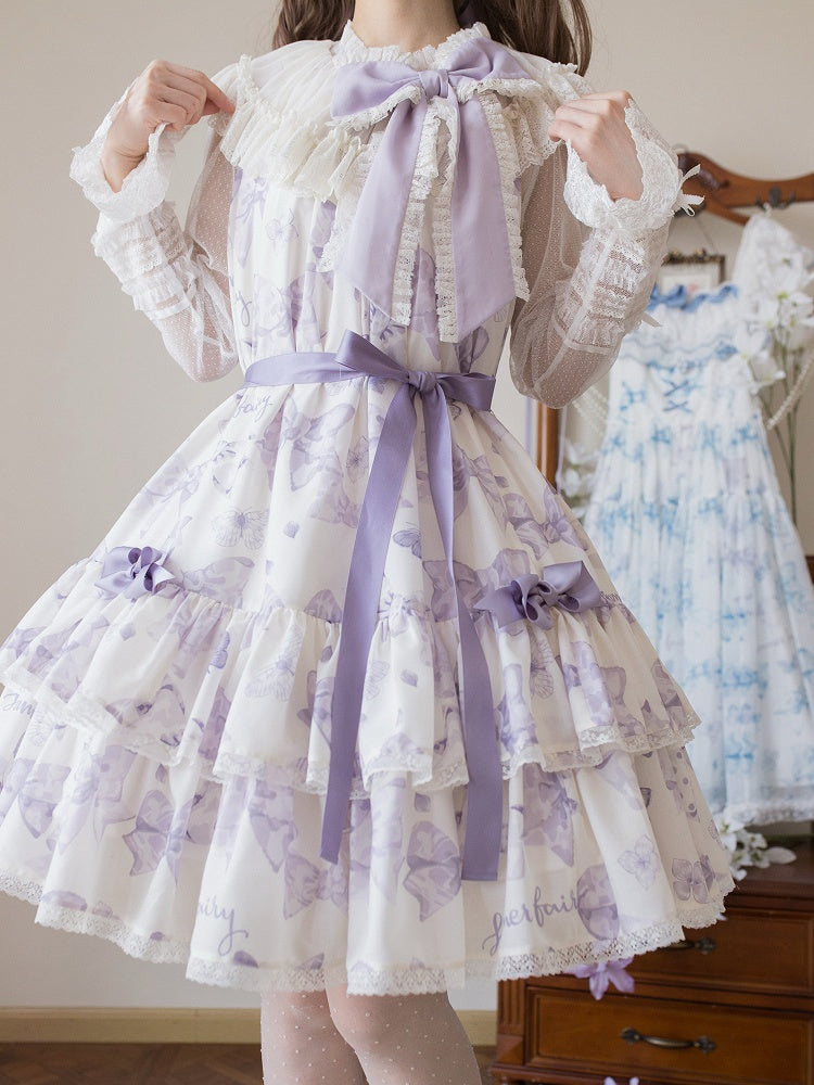 Robe Lolita violette à gros nœud sur le décolleté et imprimé nœuds double épaisseur