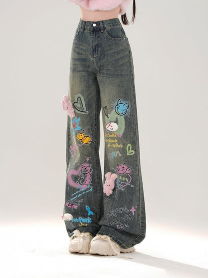Wide-Leg Jeans with Colorful Graffiti and Detachable Pink Bunny Plushie Blue