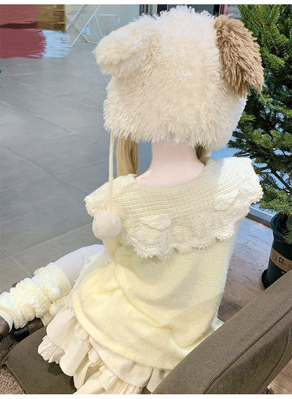 Pull jaune à col rond et plat + cardigan blanc + jupe doublée à trois épaisseurs