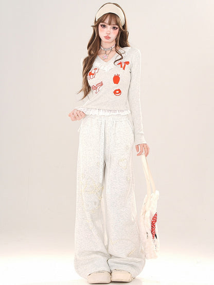 Haut slim noir/gris à col en V et bordure en dentelle