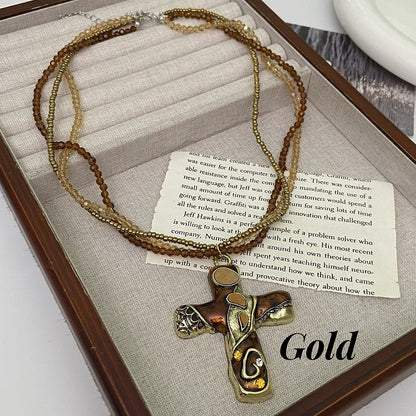 Gold/Brown Cross Pendant Triple Layered Beaded Necklace