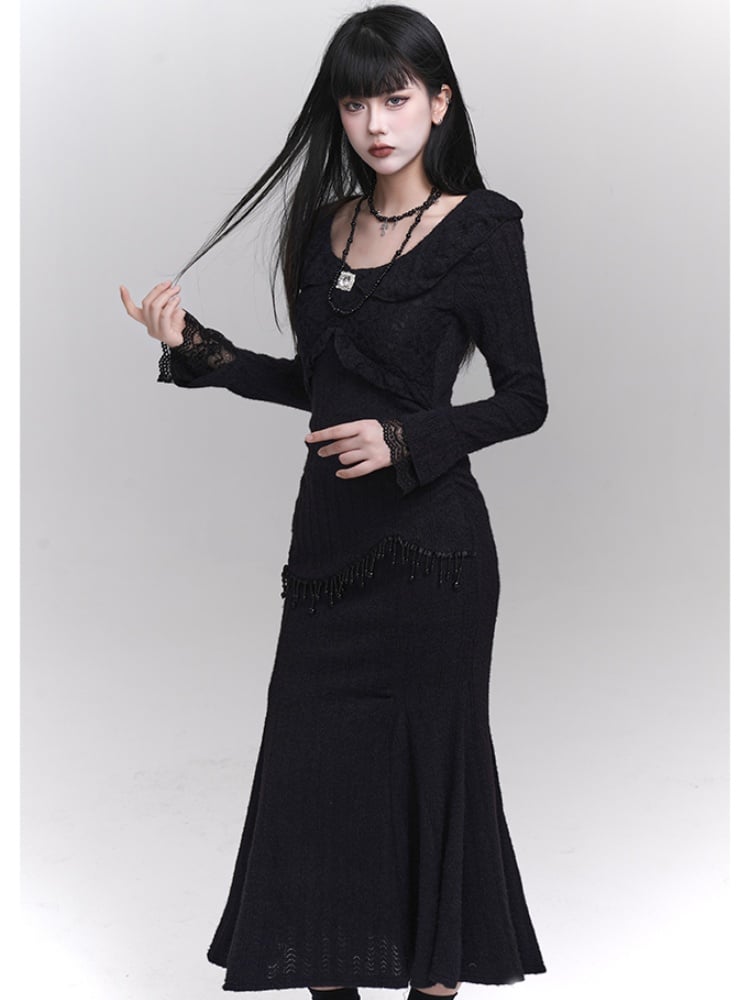 Robe sirène noire ajustée à col rond et détails en perles