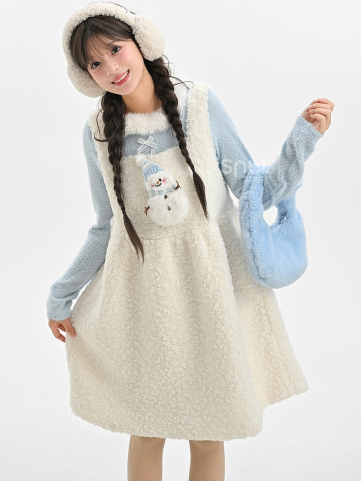 Haut à manches longues et col en peluche bleu avec détails nœud