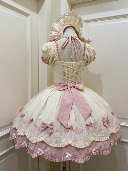 Gewellter Rand, Scool Lolita-Baumwolle, gelber Rock, Akzente, rosa Kleid und Schleife, alte Borte
