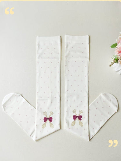 Bas cuissardes blancs à pois avec motif cuillère et nœud